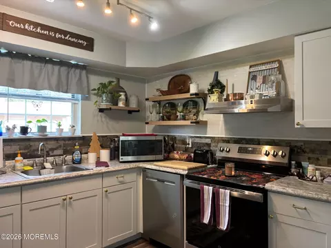 Kitchen - 11 Amesbury Rd #E, Whiting, NJ 08759 photo 2 of 5