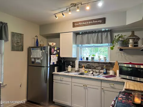 Kitchen - 11 Amesbury Rd #E, Whiting, NJ 08759 photo 4 of 5
