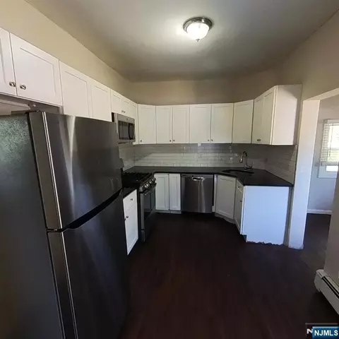 Kitchen - 83 E Forest Ave, Teaneck, NJ 07666 photo 1 of 2