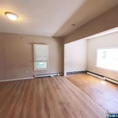 Living - 83 E Forest Ave, Teaneck, NJ 07666 photo 1 of 3