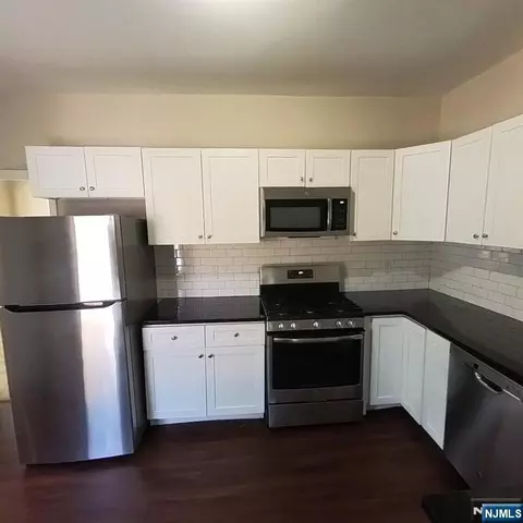 Kitchen - 83 E Forest Ave, Teaneck, NJ 07666 photo 2 of 2