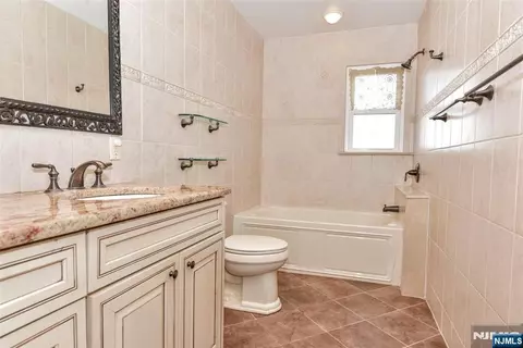 Bath - 77 Herman St, Hackensack, NJ 07601 photo 2 of 2