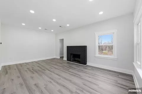 Living - 31 Saint Moritz Pl, Wayne, NJ 07470 photo 1 of 2
