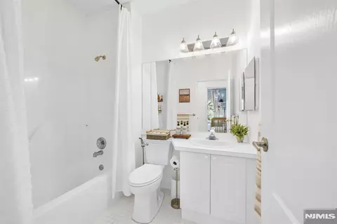 Bath - 409 Brittany Dr, Wayne, NJ 07470 photo 1 of 2