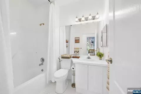 Bath - 409 Brittany Dr, Wayne, NJ 07470 photo 1 of 2