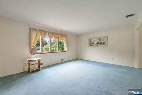 Living - 48 Andover Dr, Wayne, NJ 07470 photo 1 of 3