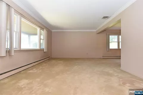 Living - 317 Mckinley Blvd, Paramus, NJ 07652 photo 1 of 9