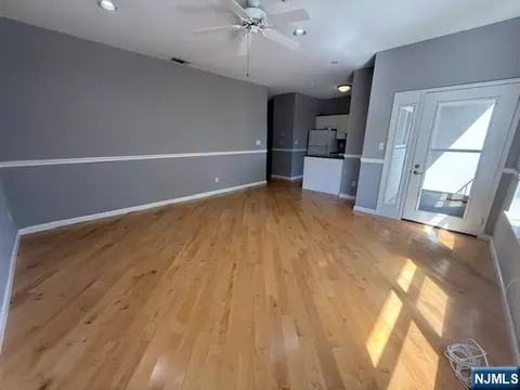 Living - 312 Brittany Dr, Wayne, NJ 07470 photo 2 of 3