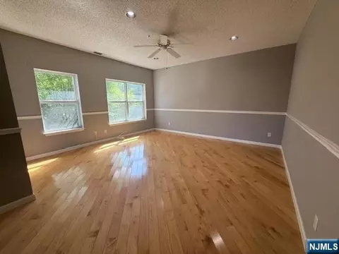 Living - 312 Brittany Dr, Wayne, NJ 07470 photo 1 of 3