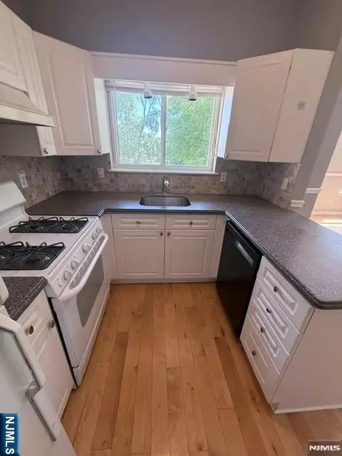 Kitchen - 312 Brittany Dr, Wayne, NJ 07470 photo 2 of 2