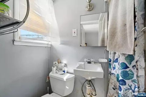 Bath - 34 Pennington Ave, Passaic, NJ 07055 photo 2 of 7