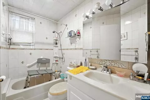 Bath - 34 Pennington Ave, Passaic, NJ 07055 photo 3 of 7