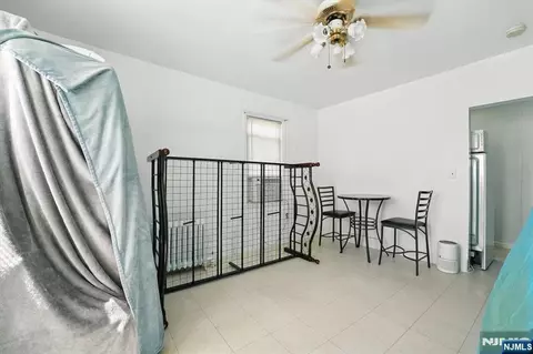 Bedroom - 34 Pennington Ave, Passaic, NJ 07055 photo 9 of 10