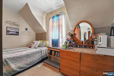 Bedroom - 34 Pennington Ave, Passaic, NJ 07055 photo 7 of 10