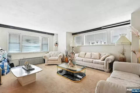 Living - 34 Pennington Ave, Passaic, NJ 07055 photo 2 of 2