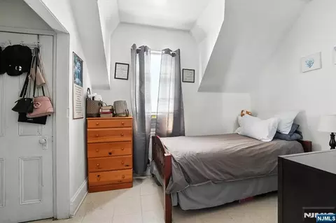 Bedroom - 34 Pennington Ave, Passaic, NJ 07055 photo 4 of 10