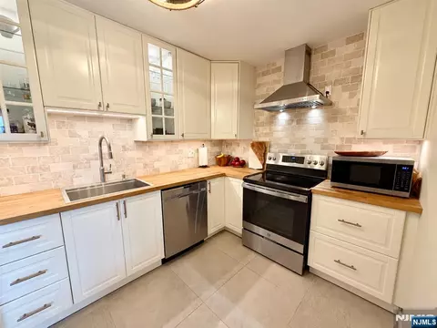 Kitchen - 76 E Maple St, Teaneck, NJ 07666 photo 1 of 2