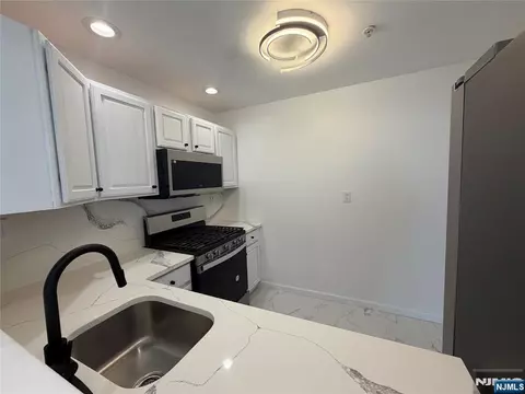 Kitchen - 131 Clinton Pl #214, Hackensack, NJ 07601 photo 1 of 4