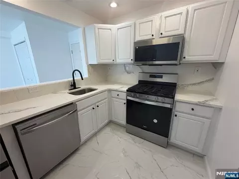 Kitchen - 131 Clinton Pl #214, Hackensack, NJ 07601 photo 3 of 4