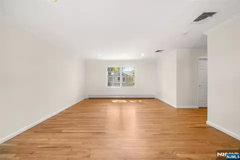 Living - 220 Concord Dr, Paramus, NJ 07652 photo 8 of 9