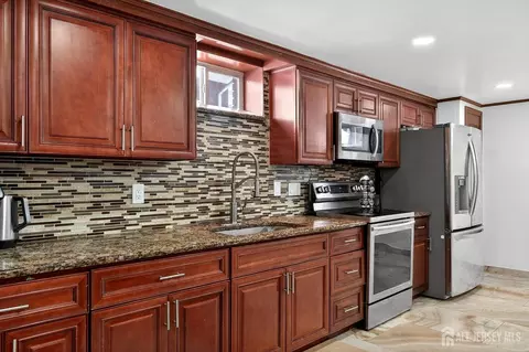 Kitchen - 6 E 2nd St, Port Reading, NJ 07064 photo 3 of 5