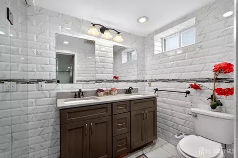 Bath - 6 E 2nd St, Port Reading, NJ 07064 photo 2 of 3