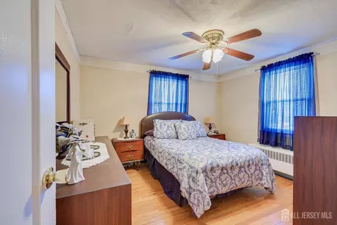 Bedroom - 105 E Cliff Rd, Colonia, NJ 07067 photo 1 of 4