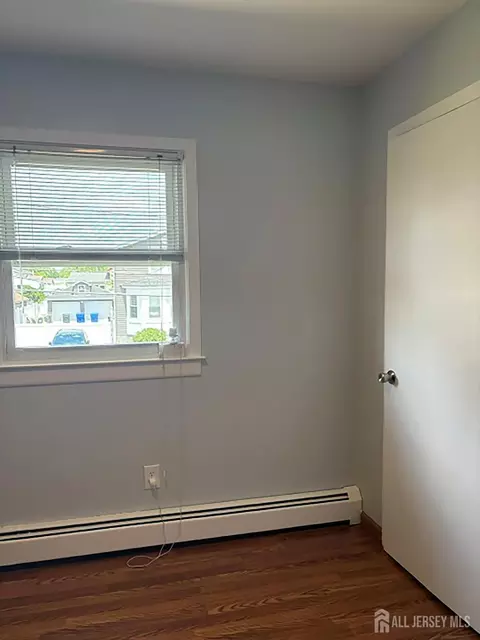 Bedroom - 16 E Pleasant Ave, Sewaren, NJ 07077 photo 4 of 5