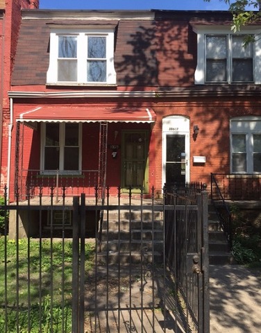 10615 S Champlain Ave, Chicago, IL 60628 photo 1