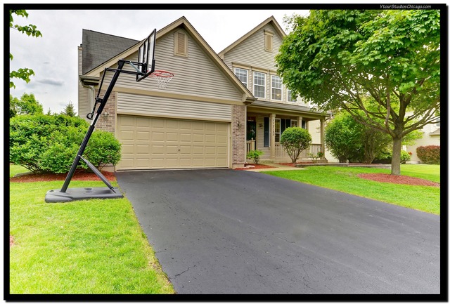 11715 S Derby Ln, Plainfield, IL 60585 photo 2