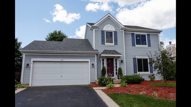 584 Covered Bridge Dr, Elgin, IL 60124 photo 1