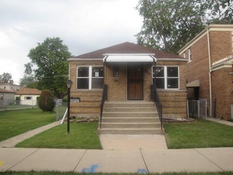 10042 S Eberhart Ave, Chicago, IL 60628 photo 1
