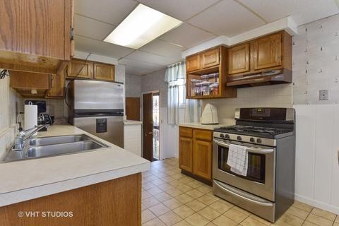 10807 S Emerald Ave, Chicago, IL 60628 photo 4