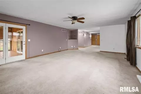 Living - 304 7th St, Hampton, IL 61256 photo 4 of 5