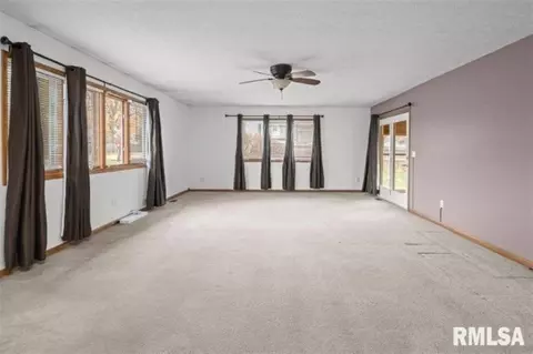 Living - 304 7th St, Hampton, IL 61256 photo 3 of 5