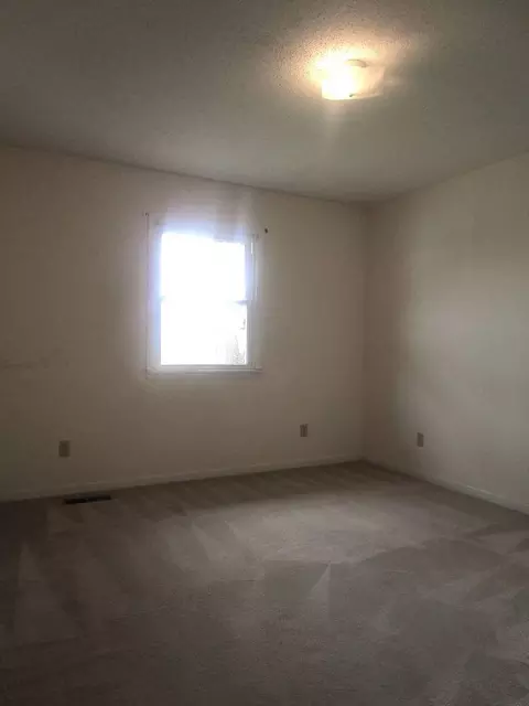 Bedroom - 306 College Blvd, Carmi, IL 62821 photo 2 of 3