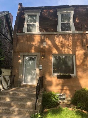 11119 S Champlain Ave, Chicago, IL 60628 photo 1