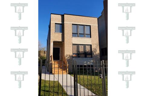 4223 S Champlain Ave, Chicago, IL 60653 photo 1