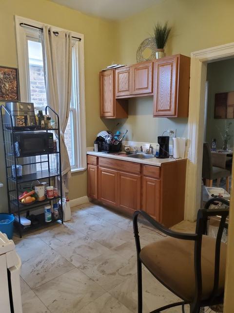 7311 S Champlain Ave, Chicago, IL 60619 photo 3