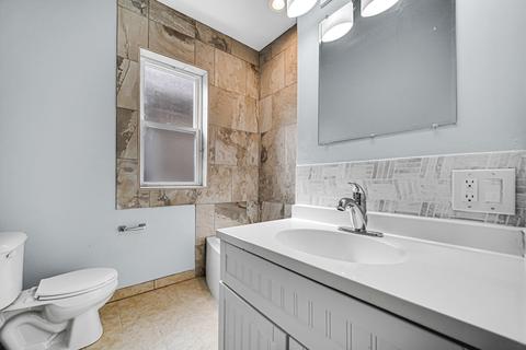 7545 S Champlain Ave, Chicago, IL 60619 photo 17