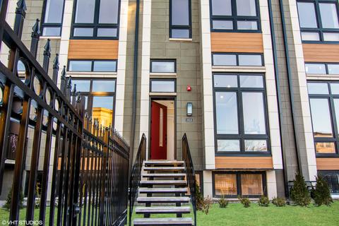 1009 E 62nd St, Chicago, IL 60637 photo 1