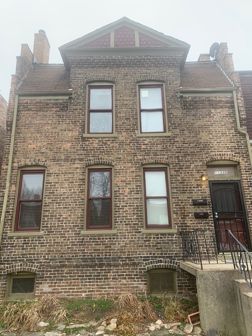 11325 S Champlain Ave, Chicago, IL 60628 photo 1