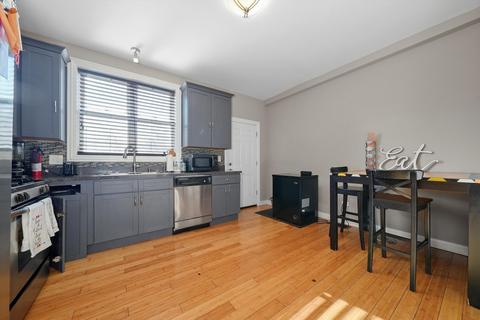 10730 S Champlain Ave, Chicago, IL 60628 photo 4