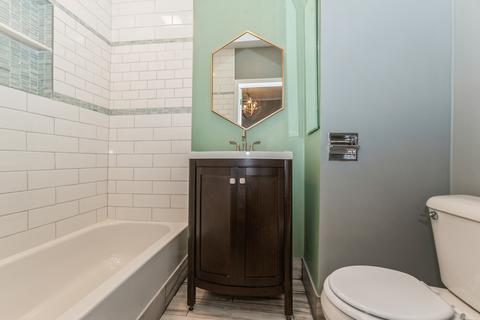 10720 S Champlain Ave, Chicago, IL 60628 photo 15