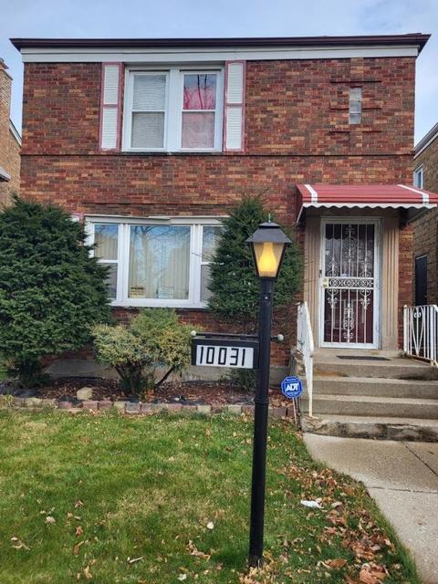10031 S Eberhart Ave, Chicago, IL 60628 photo 1