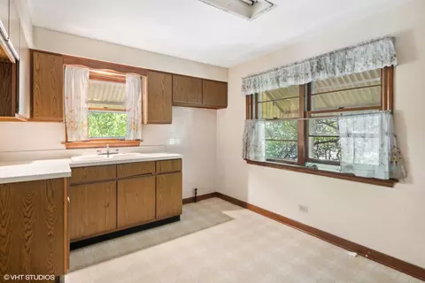 7128 Wolf Rd, Burr Ridge, IL 60527 photo 2