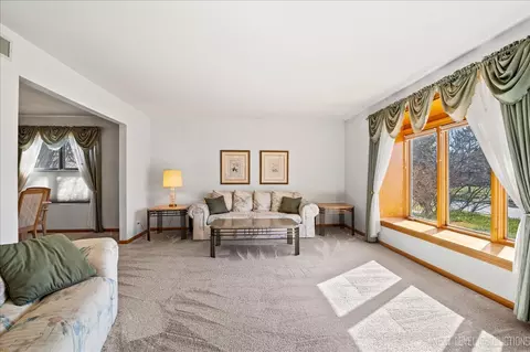 Living - 1250 John Dr, Hoffman Estates, IL 60169 photo 1 of 5