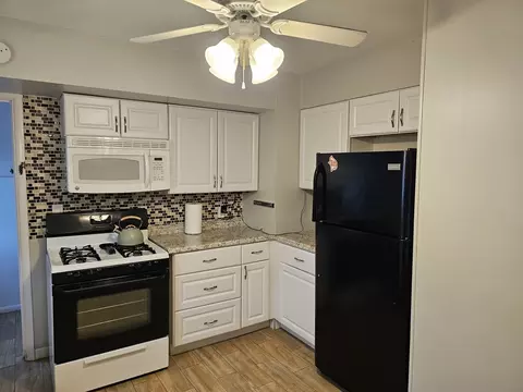 Kitchen - 111 W Cypress St, Normal, IL 61761 photo 2 of 2