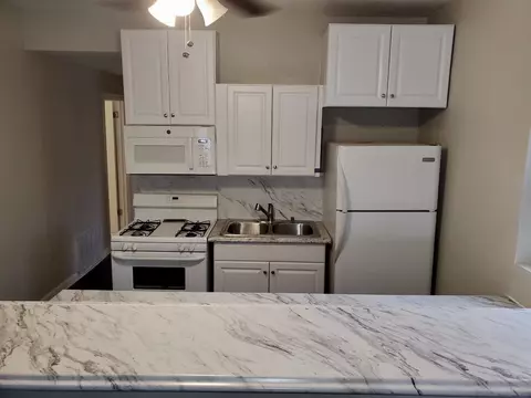 Kitchen - 3058 E 87th St, Chicago, IL 60617 photo 1 of 7