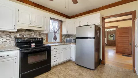 Kitchen - 604 Main St, Leaf River, IL 61047 photo 2 of 3